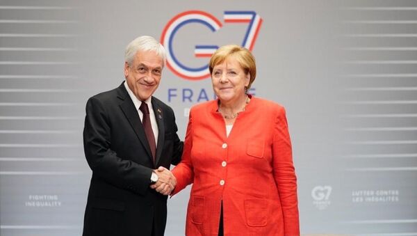 El presidente chileno, Sebastián Piñera, y la canciller de Alemania, Angela Merkel - Sputnik Mundo