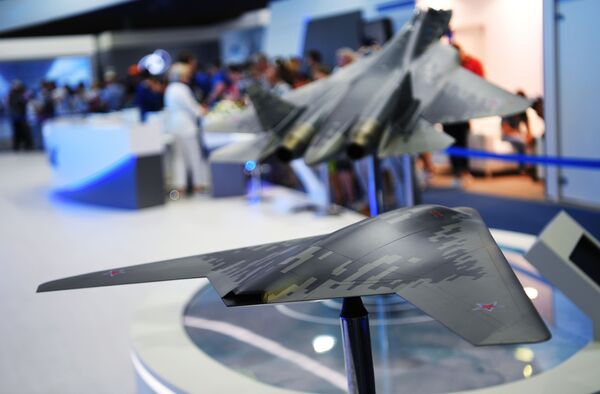 Desvelan la apariencia final del dron de ataque ruso S-70 Ojotnik (fotos) Desvelan la apariencia final del dron de ataque ruso S-70 Ojotnik (fotos) - Sputnik Mundo