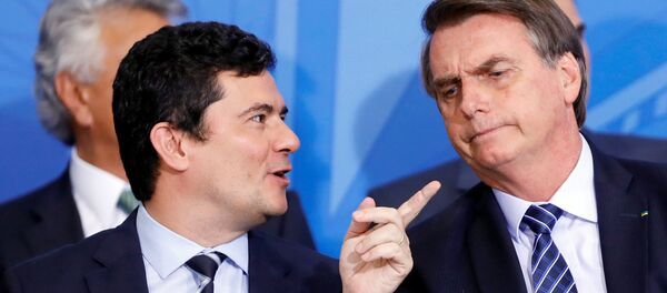 El ministro de Justicia de Brasil Sergio Moro y el presidente brasileño Jair Bolsonaro El ministro de Justicia de Brasil Sergio Moro y el presidente brasileño Jair Bolsonaro - Sputnik Mundo