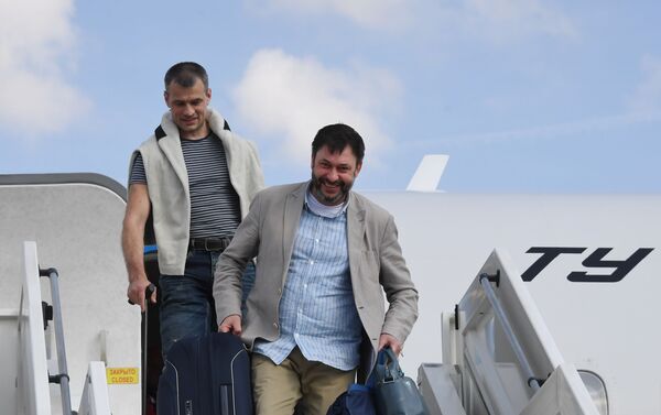 Kiril Vishinski, jefe del portal RIA Novosti Ukraina arriba a Moscú tras una detención de más de un año en Ucrania - Sputnik Mundo