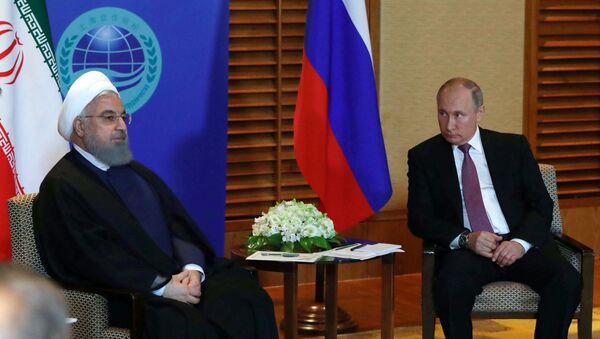 El presidente ruso, Vladimir Putin y su homólogo iraní, Hasán Rohaní  - Sputnik Mundo