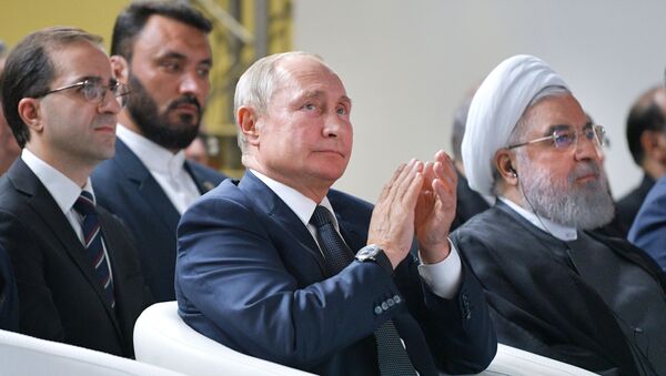 Los presidentes de Rusia e Irán, Vladímir Putin y Hasan Rohaní - Sputnik Mundo