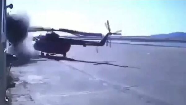 Un helicóptero queda destrozado al chocar contra un edificio - Sputnik Mundo