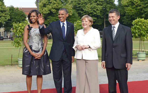 La canciller alemana Angela Merkel junto a su esposo Joachim Sauer, recibieron en Berlín al expresidente de EEUU, Barack Obama y su esposa Michelle Obama - Sputnik Mundo