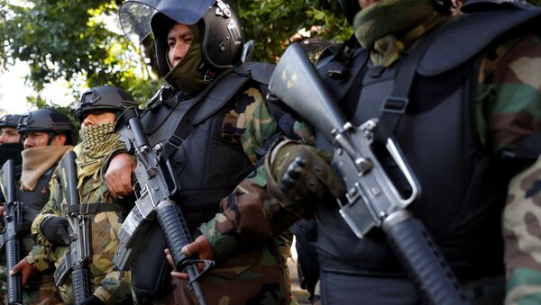 Efectivos de la Policía de Bolivia en una ceremonia tras la salida de Evo Morales - Sputnik Mundo