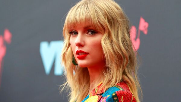 Taylor Swift, cantante estadounidense - Sputnik Mundo