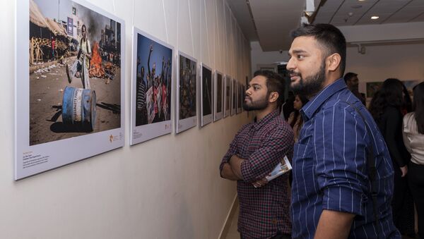 La inauguración de la exposición de fotos de ganadores del concurso Andréi Stenin 2019 en Nueva Delhi  - Sputnik Mundo