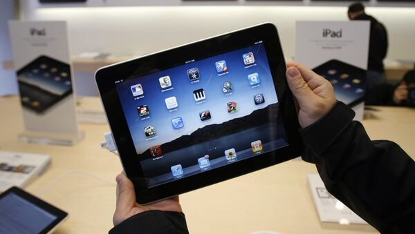 El primer día de ventas de iPad de Apple (2010) - Sputnik Mundo