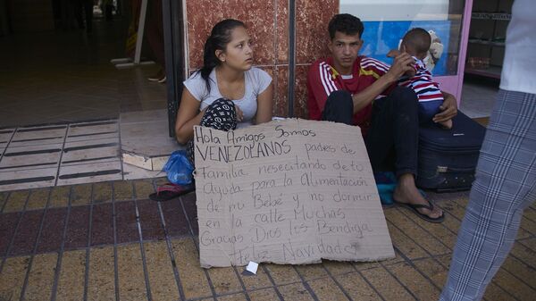Migrantes venezolanos en Chile - Sputnik Mundo