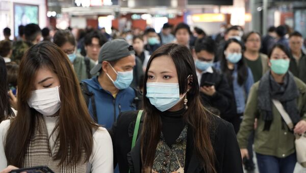 Los chinos llevan máscaras para no contagiarse - Sputnik Mundo