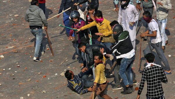 Los disturbios en Nueva Delhi - Sputnik Mundo