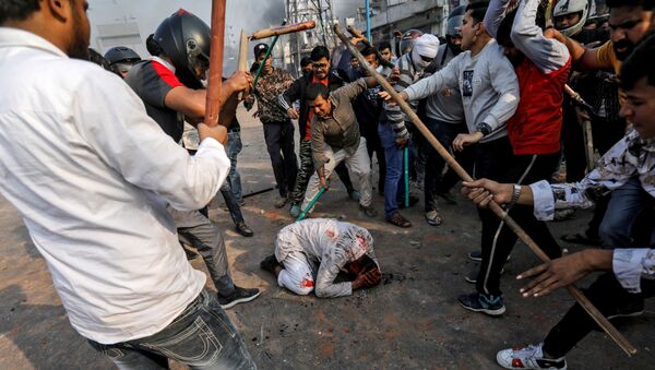 Los disturbios en Nueva Delhi - Sputnik Mundo