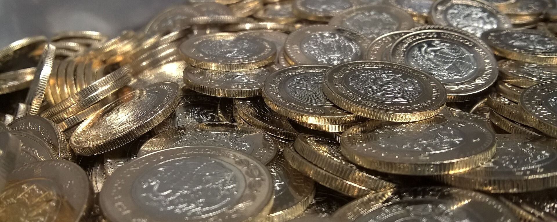 Pesos mexicanos. Monedas. Imagen referencial - Sputnik Mundo, 1920, 01.12.2021