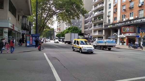 La Avenida 18 de Julio de Montevideo durante la pandemia por coronavirus - Sputnik Mundo