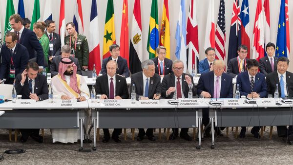 Presidentes durante una cumbre del G20 - Sputnik Mundo
