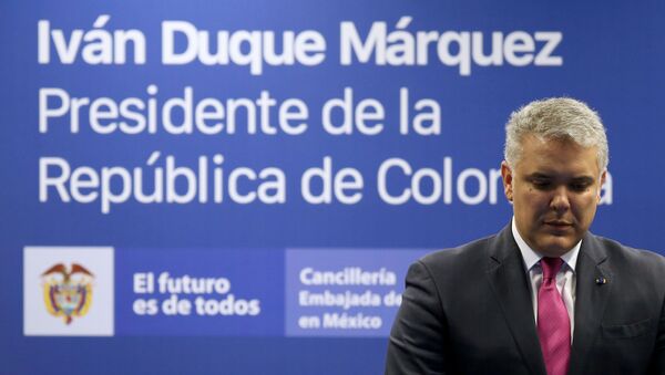 El presidente de Colombia Iván Duque durante una conferencia de prensa - Sputnik Mundo