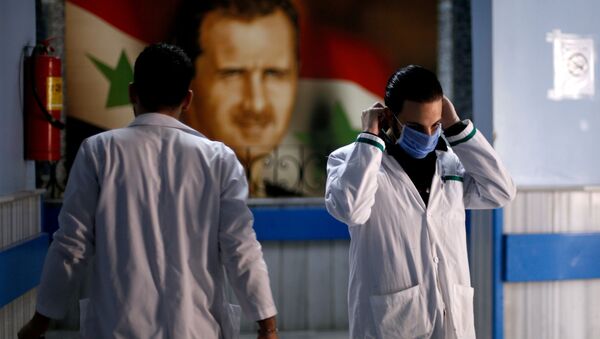 Médicos en un hospital de Damasco, Siria - Sputnik Mundo