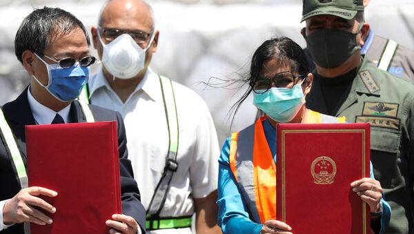 Ayuda humanitaria de China a Venezuela, recibida por embajador chino Li Baorong y vicepresidenta Delcy Rodríguez - Sputnik Mundo