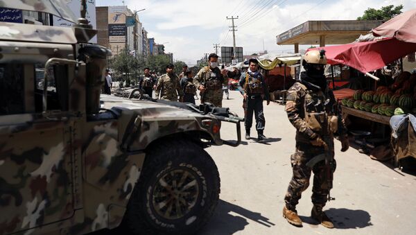 Las Fuerzas de Seguridad de Afganistán en el lugar del ataque en Kabul - Sputnik Mundo