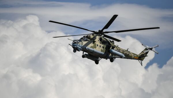 Un helicóptero Mi-24 (archivo) - Sputnik Mundo