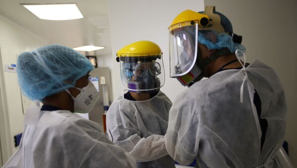 Unos médicos en un hospital de Bogotá, Colombia - Sputnik Mundo