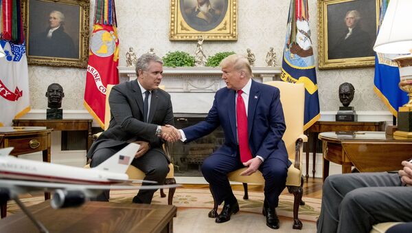 Donald Trump e Iván Duque reunidos en la Casa Blanca. Washington, 2 de marzo de 2020 - Sputnik Mundo