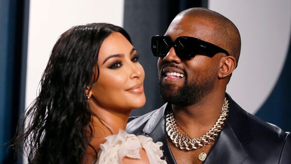 El rapero Kanye West y su esposa, Kim Kardashian - Sputnik Mundo