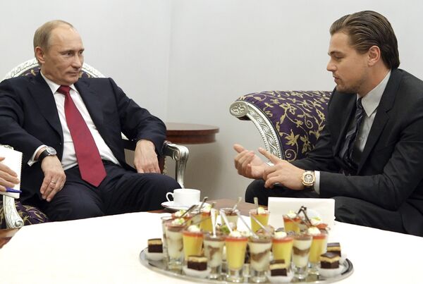 Vladímir Putin con Leonardo DiCaprio - Sputnik Mundo