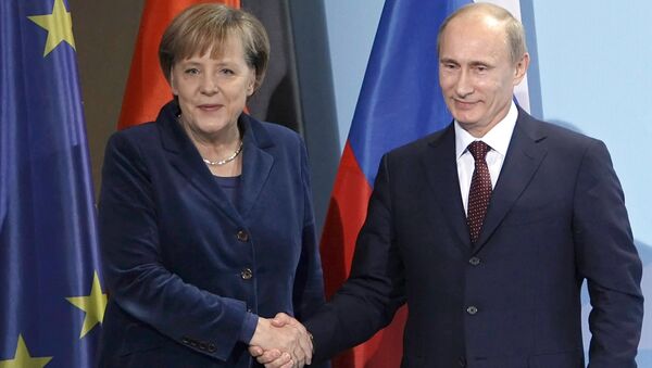 Angela Merkel y Vladímir Putin - Sputnik Mundo