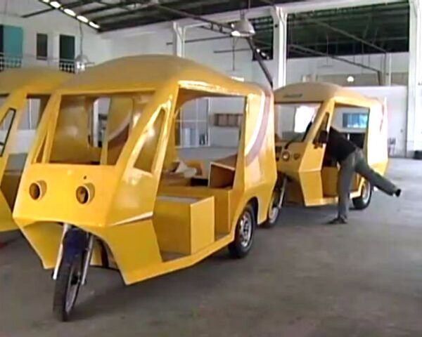 Taxistas filipinos sustituyen sus coches por motocicletas eléctricas - Sputnik Mundo