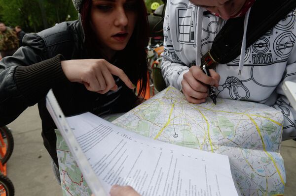 Ciclistas de Moscú se suman a la acción patriótica “Cinta de San Jorge” - Sputnik Mundo