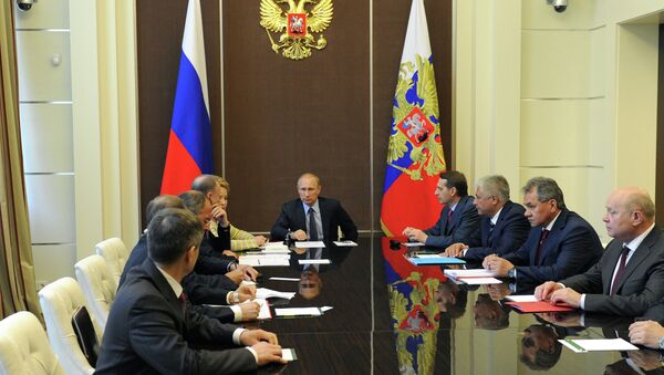 Presidente de Rusia Vladímir Putin durante la reunion con el Consejo de Seguridad de Rusa (Archivo) - Sputnik Mundo