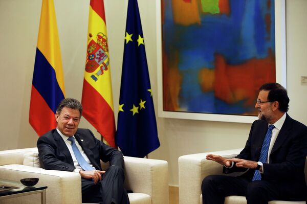 Juan Manuel Santos,presidente de Colombia y Mariano Rajoy, presidente de España - Sputnik Mundo