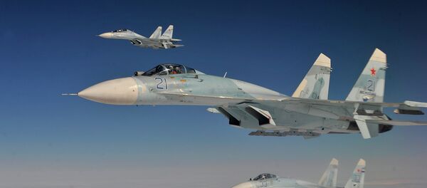 Russian Federation Air Force Su-27 aircraft intercept a simulated hijacked aircraft entering Russian airspace Aug. 27, 2013 Russian Federation Air Force Su-27 aircraft intercept a simulated hijacked aircraft entering Russian airspace Aug. 27, 2013 - Sputnik Mundo